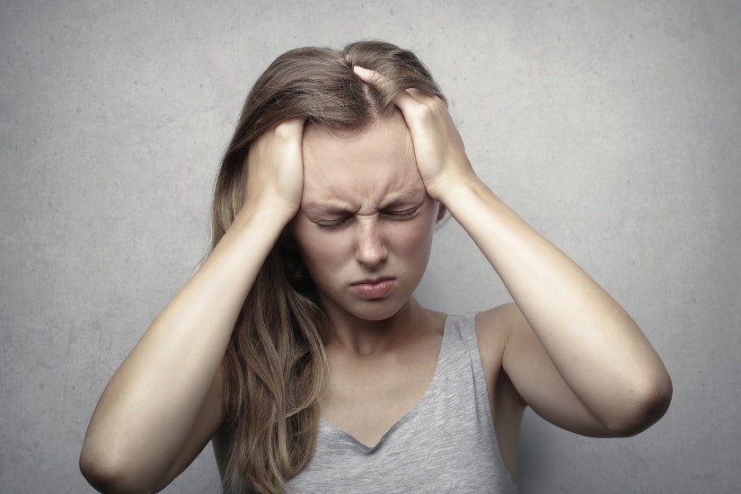 Woman stressed over hairfall