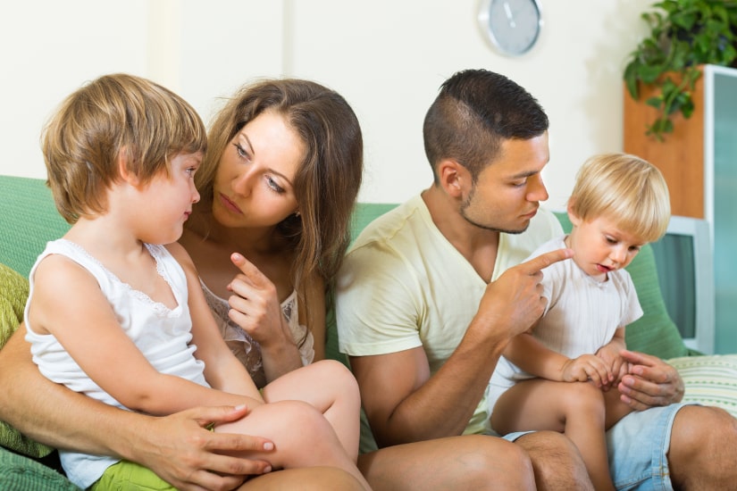 Couple scolding their kids